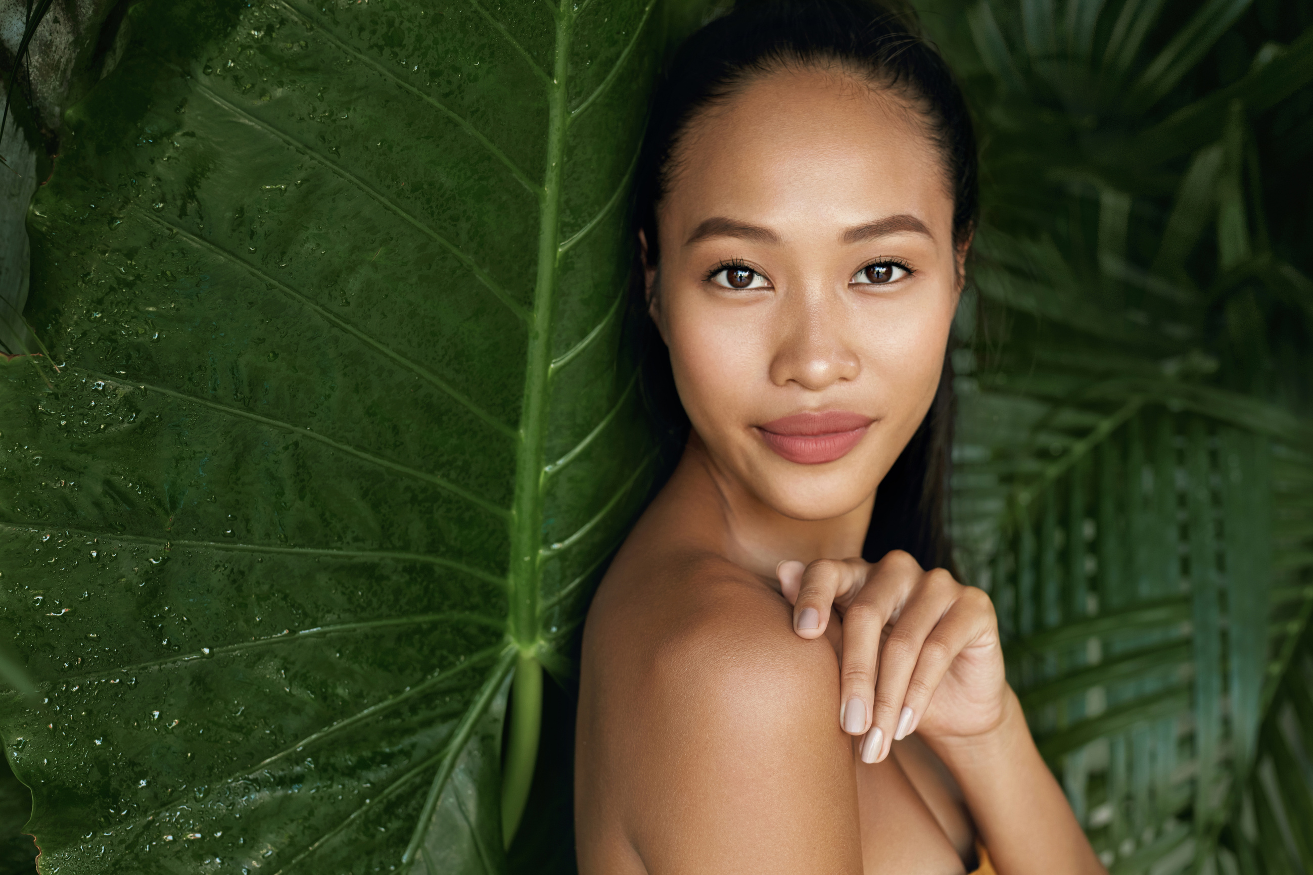 Beauty face. Woman model with natural makeup and skin in nature